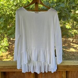 Elegant White Blouse with Ruffle Hem